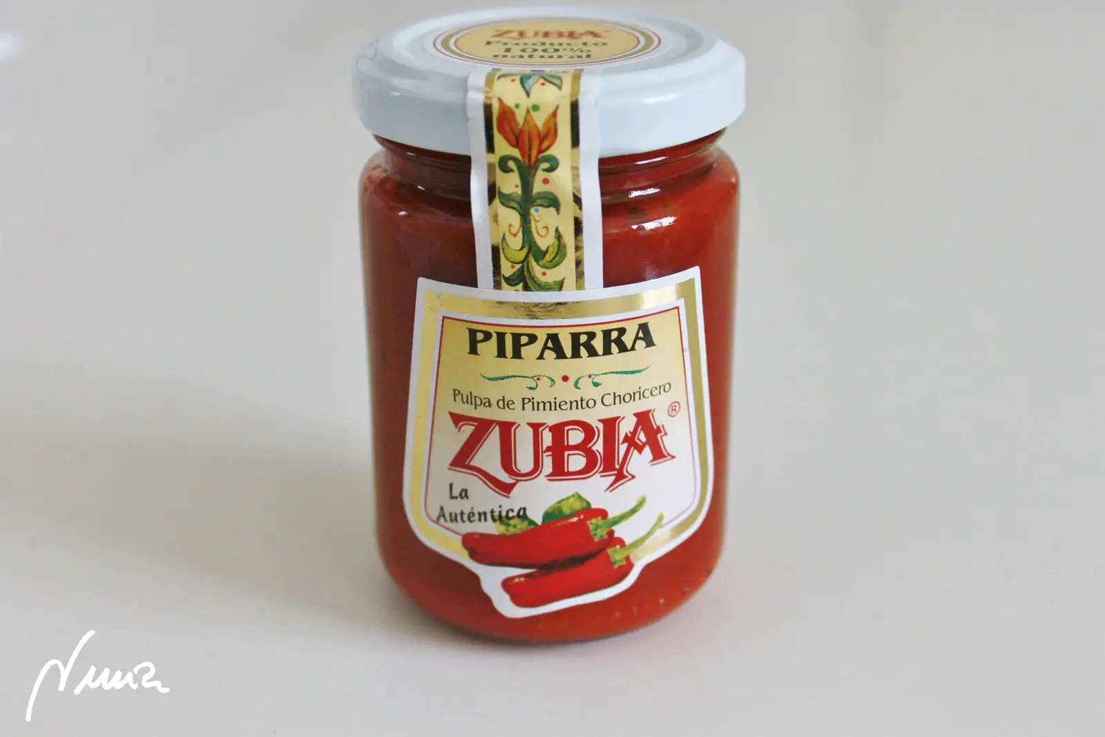 Bacalao a la vizcaína, versión fácil, paso 11: Añadir los 2 botecitos de pulpa de pimiento choricero, que una vez vacíos, se llenan de…