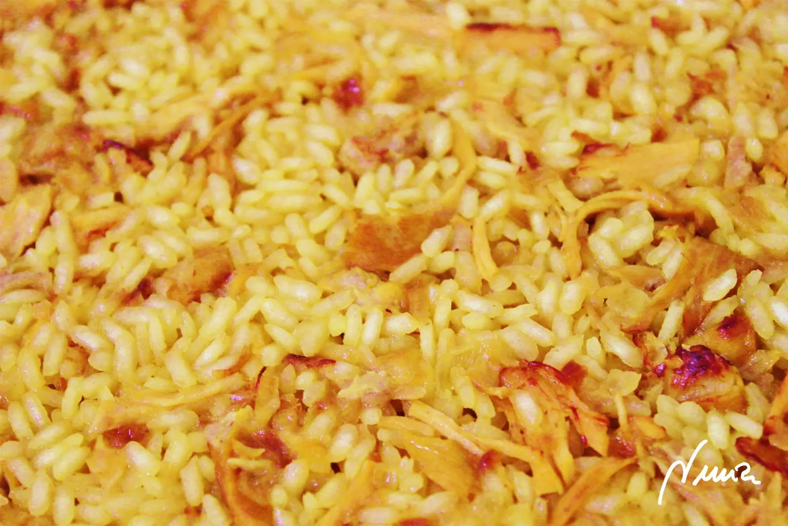 Arroz con conejo, paso 8: Apartar del fuego y dejar tapado los últimos 4 minutos, controlando no se pase el punto…