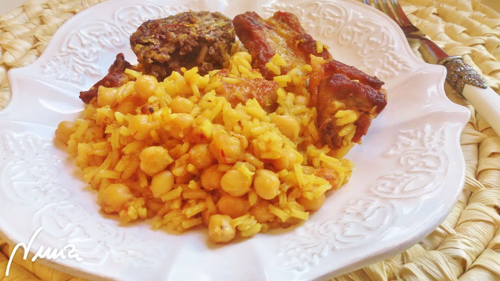 Arroz campero, paso 11: Cocer a fuego medio y destapado, durante 16-18 minutos, probar y si el arroz aún está…