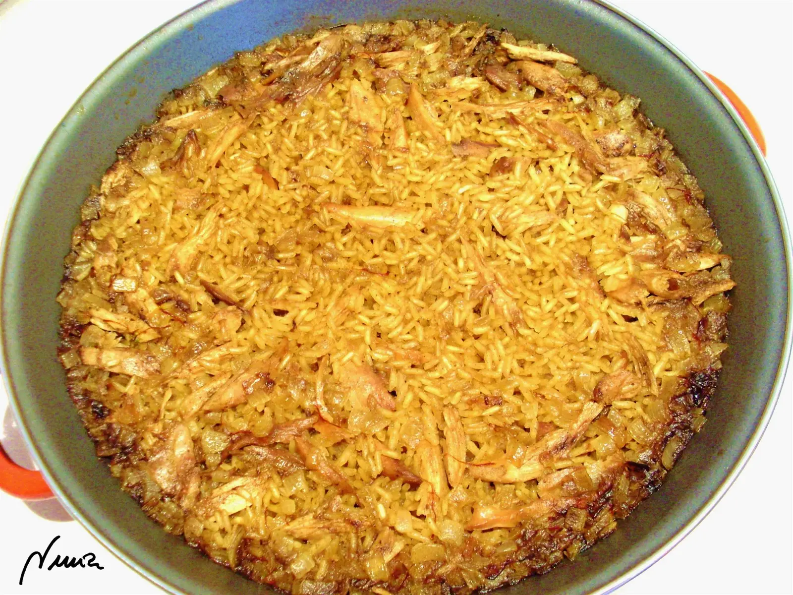 Arroz de perdiz, paso 7: Echar el caldo y dejar cocer 16-18 minutos a fuego medio, los últimos 3-4 minutos tapar…