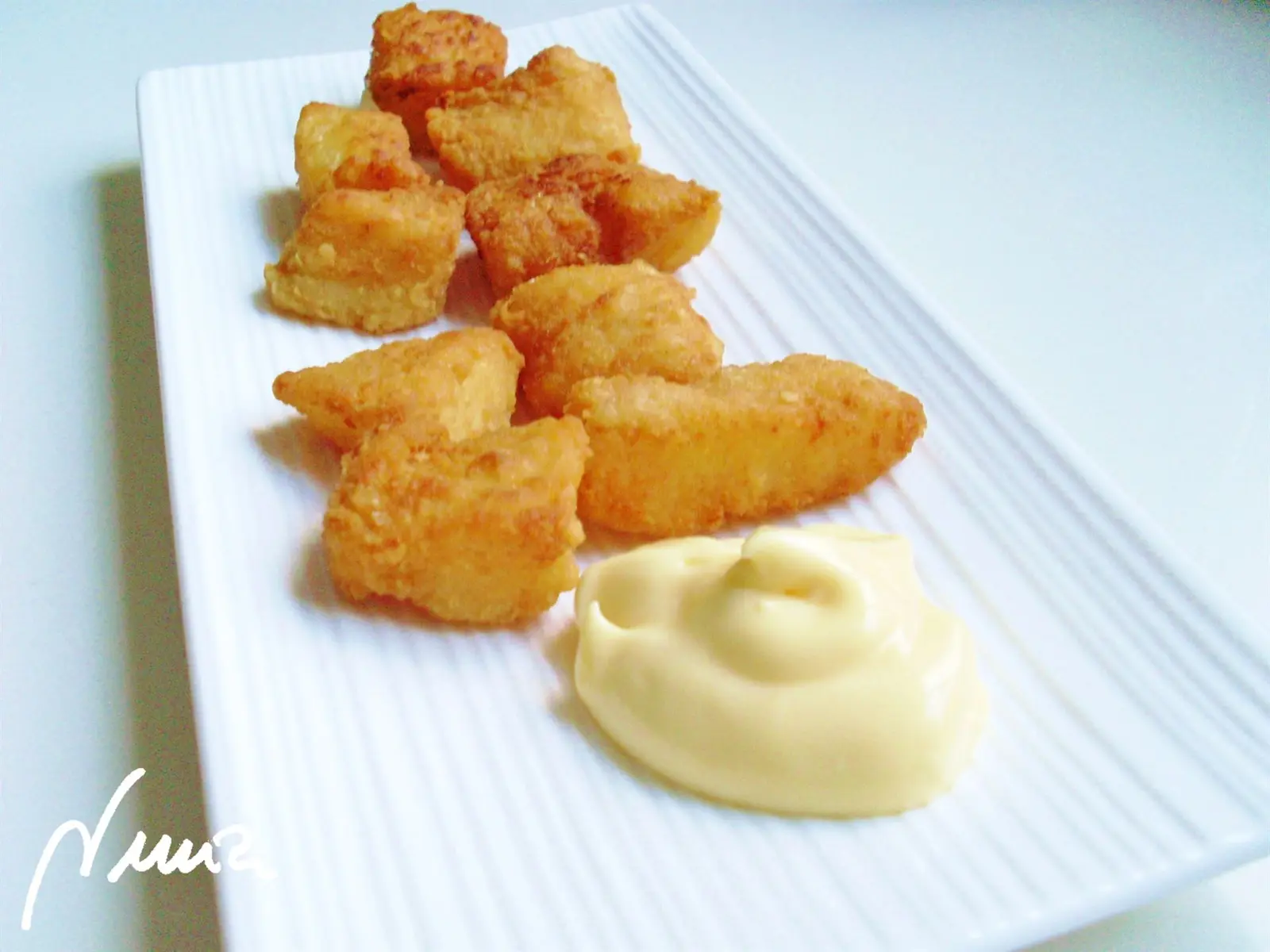 Taquitos de rosada fritos, paso 6: Sacar de la sartén y colocarlos en un plato con papel absorbente.