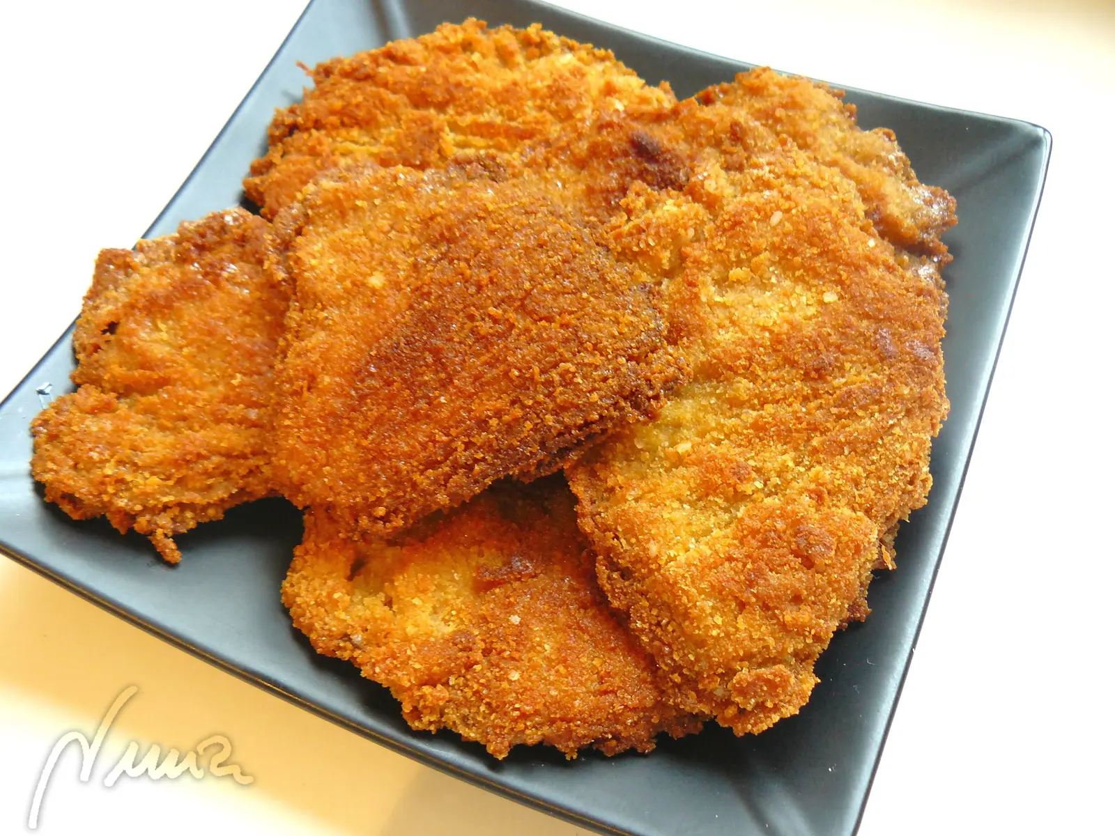 Setas empanadas, paso 4: Freír en abundante aceite de oliva hasta dorarlas.