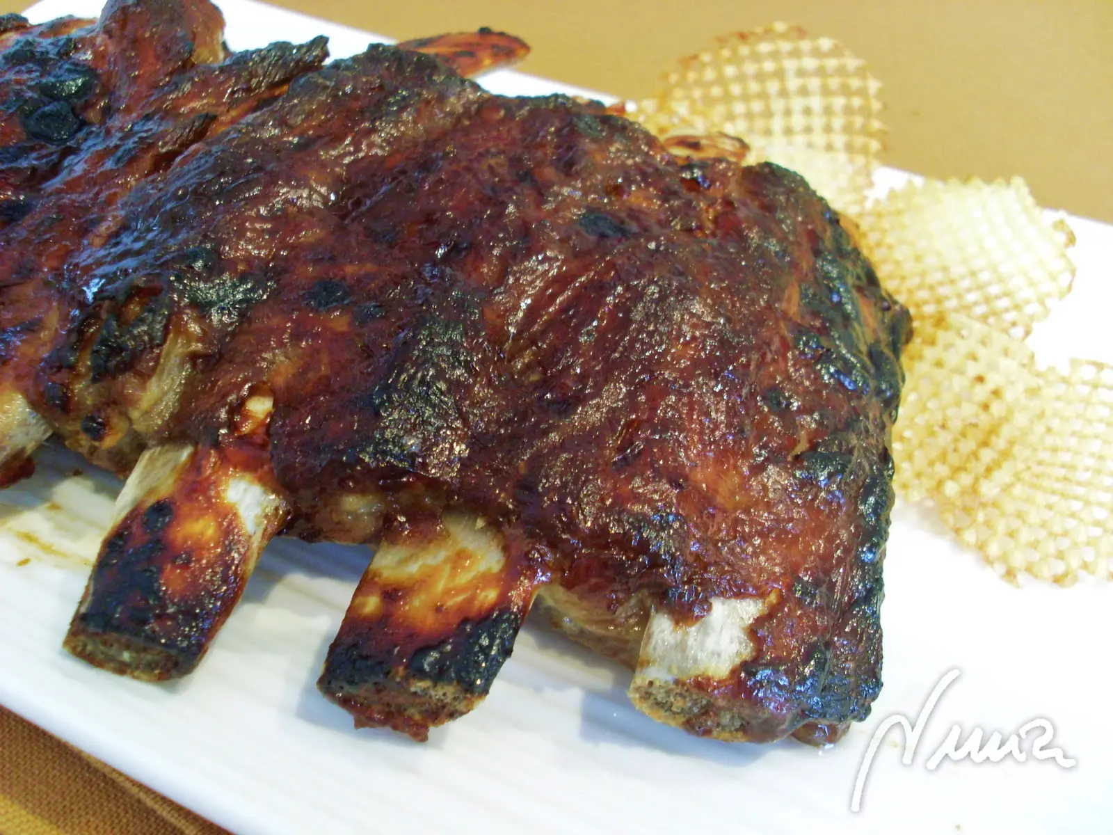 Costillar de cerdo en salsa barbacoa, paso 5: Meter el costillar en el horno y gratinar hasta dorar un poco la salsa de la superficie…