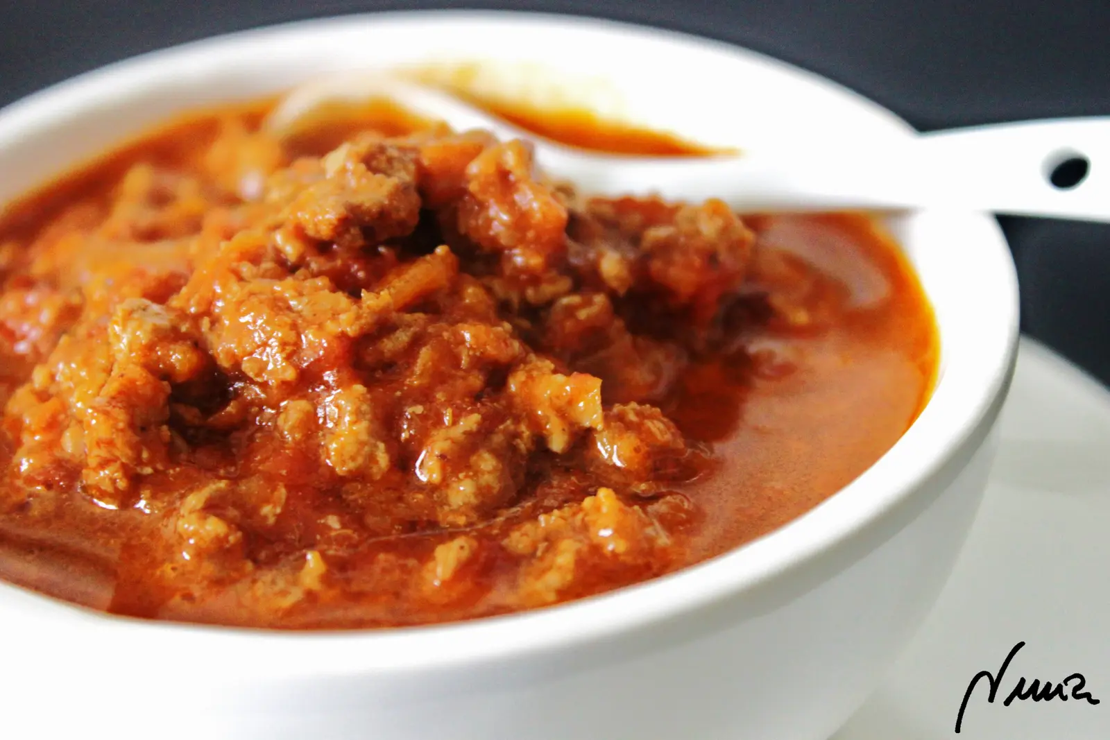 Salsa boloñesa, paso 8: Probar y sazonar al gusto.